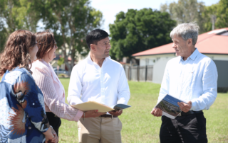 Jess Knott (Coast2Bay Housing Group), Wendy Gleeson (Project Manager, Sunshine Coast Council), Minister Lance McCallum (Minister for Employment and Small Business and Minister for Training and Skills Development) and Councillor David Law (Community Portfolio Councillor, Sunshine Coast Council) discussing plans.